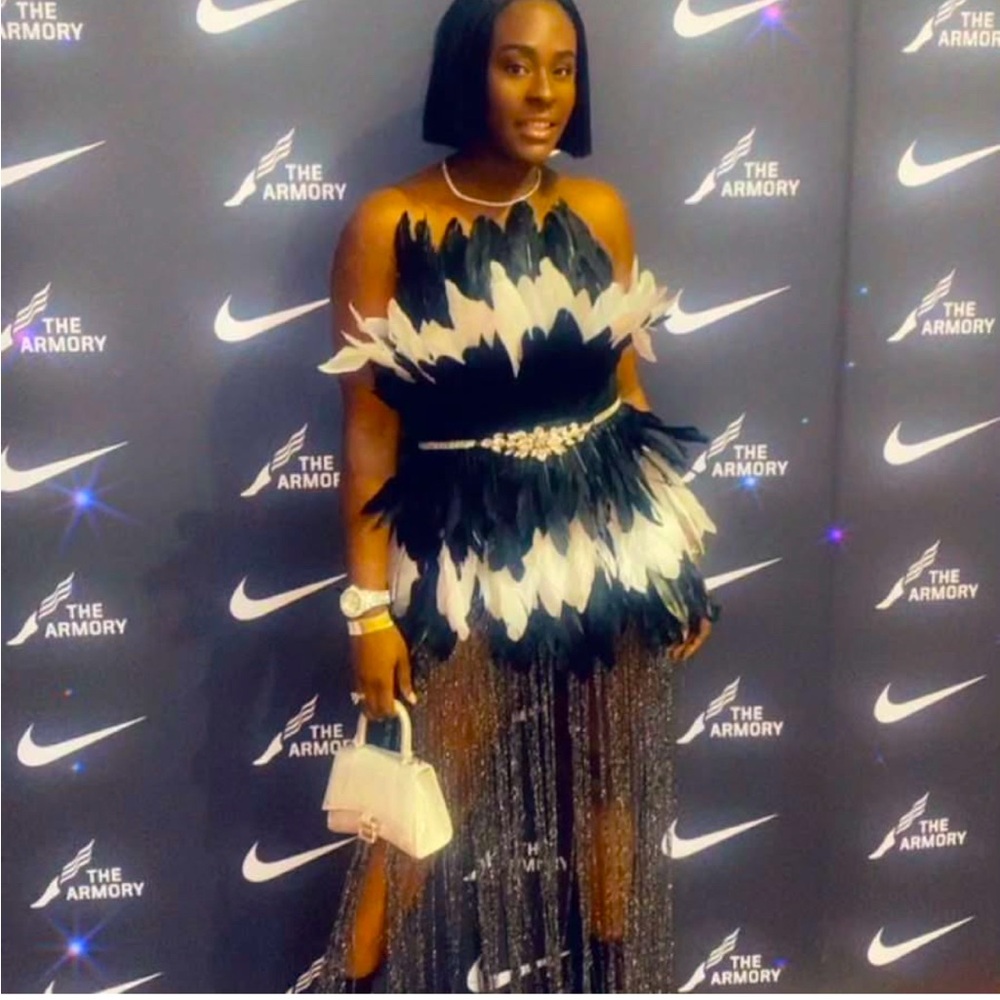 Feather dress perfect to stand out in any crowd.
